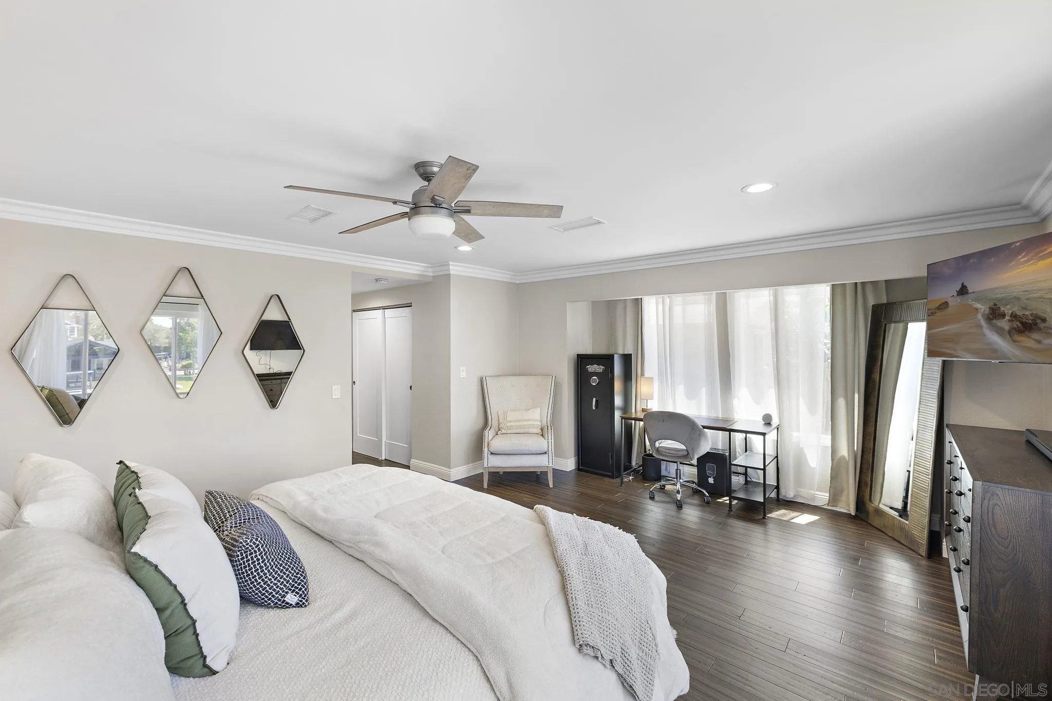 22875 Ridge Rte Lane Lake Forest, CA 92630 - Photo 19 of 54 a bedroom with a bed and a chandelier