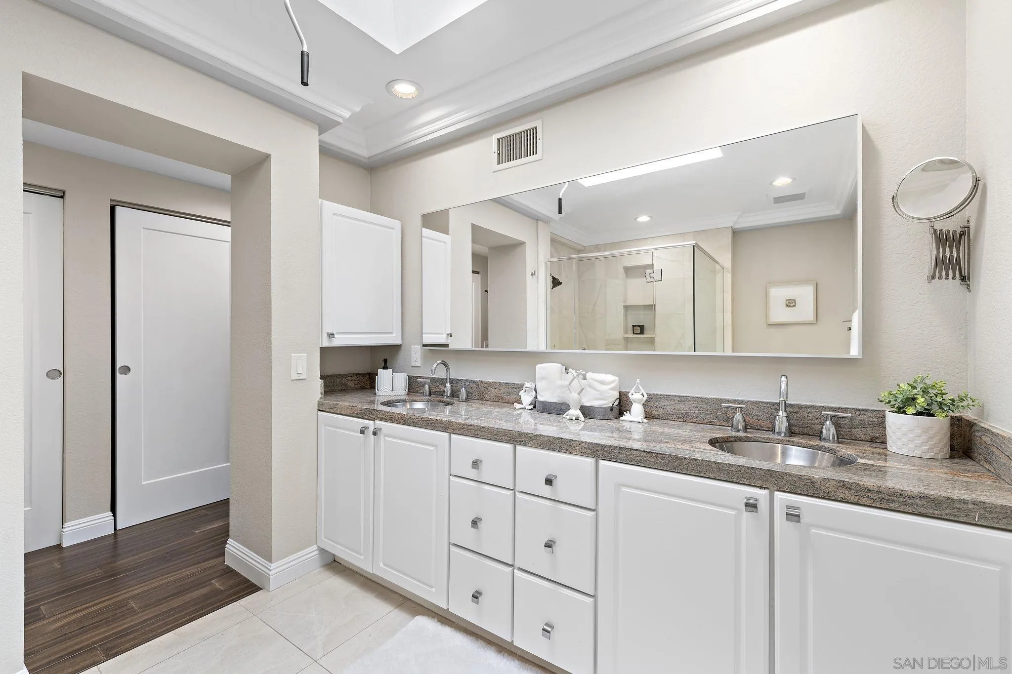 22875 Ridge Rte Lane Lake Forest, CA 92630 - Photo 25 of 54 a bathroom with a granite countertop sink mirror and double