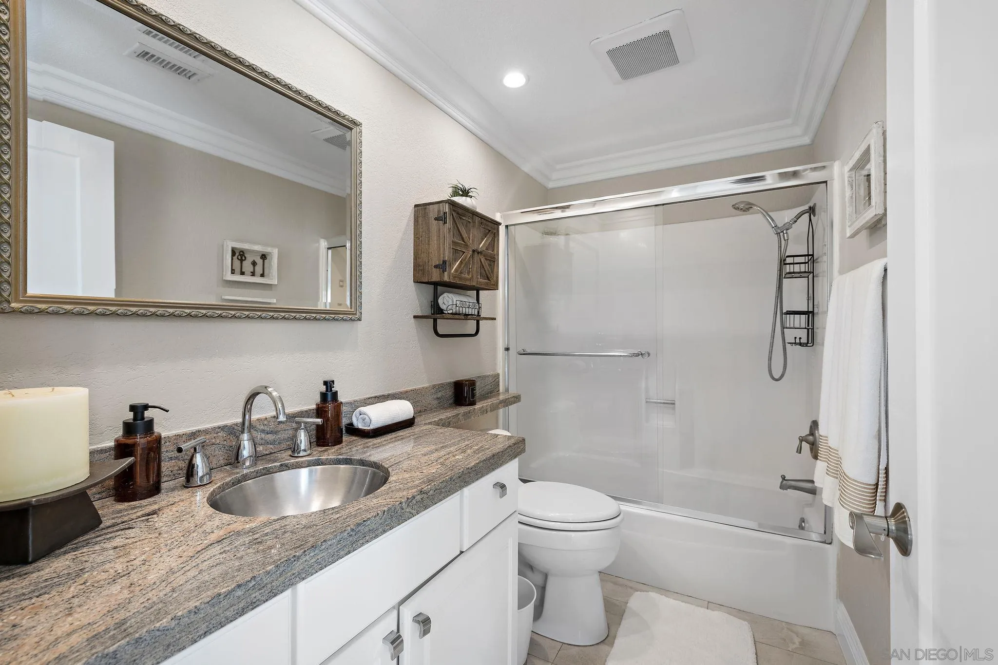 22875 Ridge Rte Lane Lake Forest, CA 92630 - Photo 28 of 54 a bathroom with a granite countertop sink toilet and shower