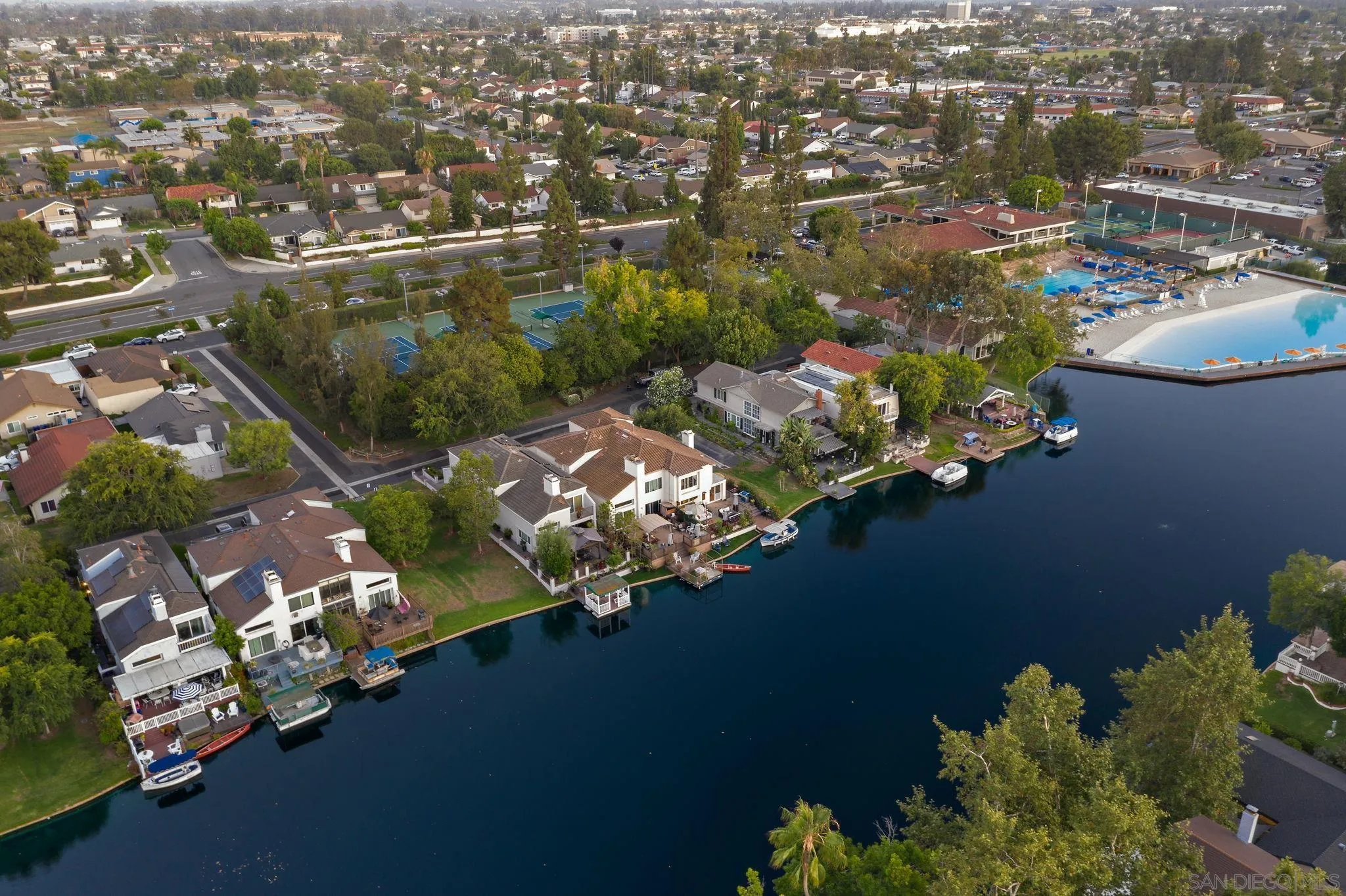 22875 Ridge Rte Lane Lake Forest, CA 92630 - Photo 50 of 54 an aerial view of a house with a yard swimming pool outdoor seating and lake view