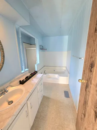 a bathroom with a bathtub