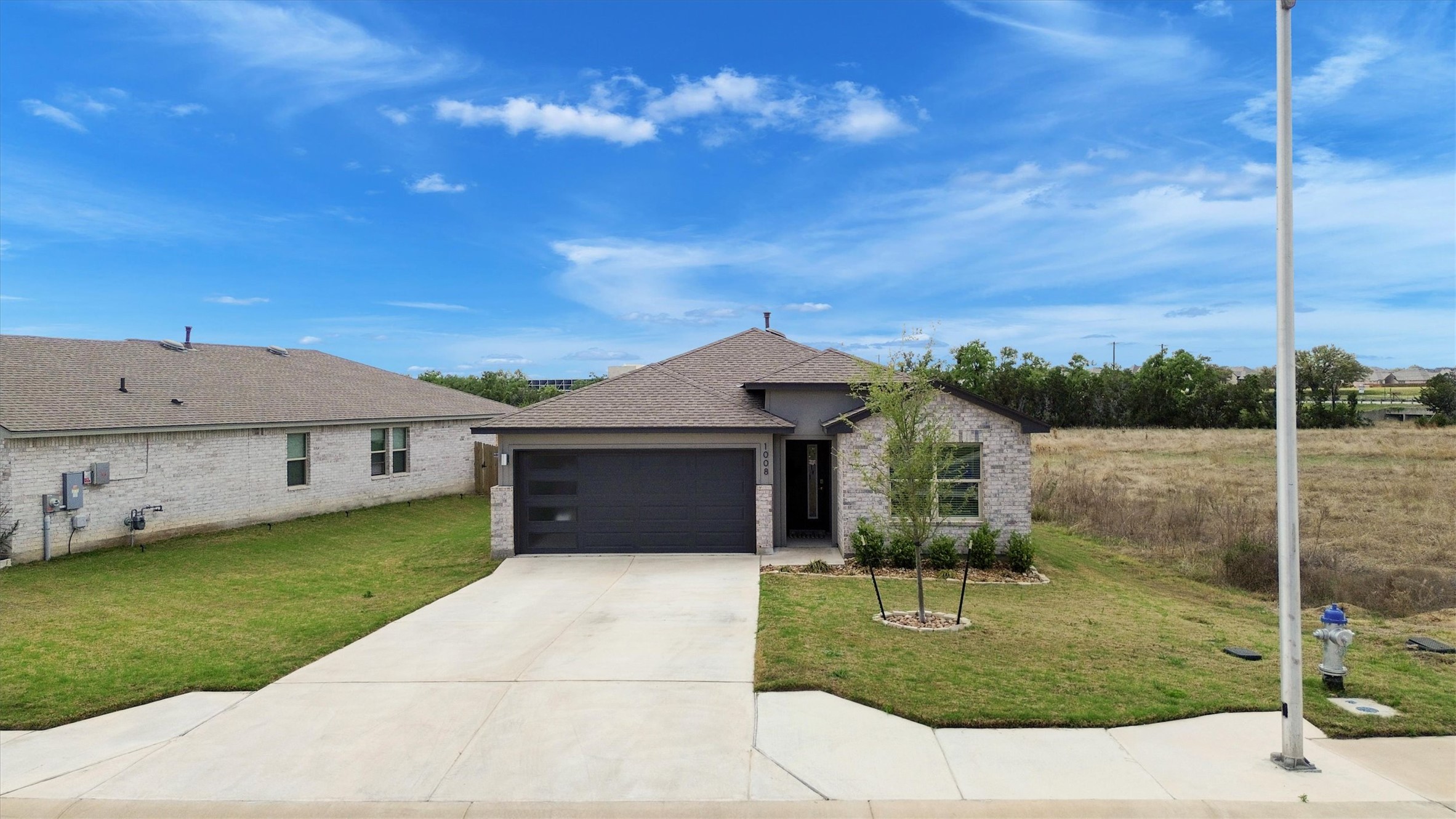 1008 Tipton Street Georgetown, TX 78633 - Photo 28 of 39 Driveway long enough to park 4 cars! Perfect for bike rides and sidewalk chalk