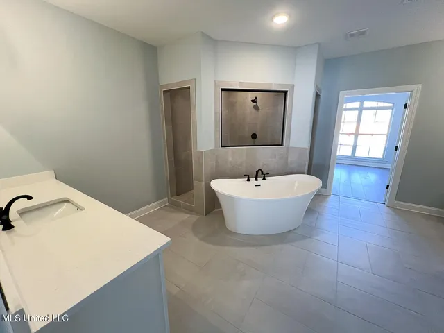 $551,000 | 26 Honey Suckle Cove, Holly Springs, MS 38635