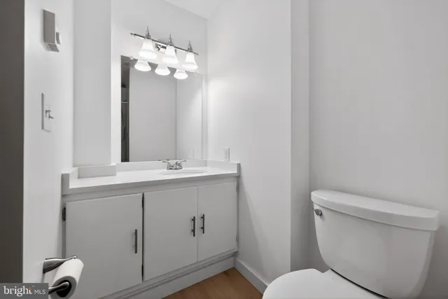 a bathroom with a shower and a glass door