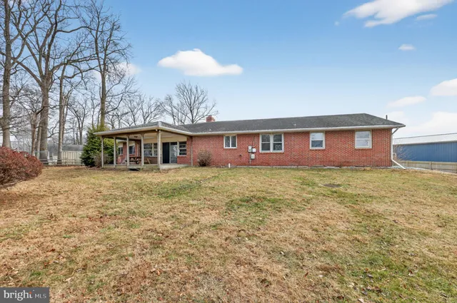 a view of a house with a porch