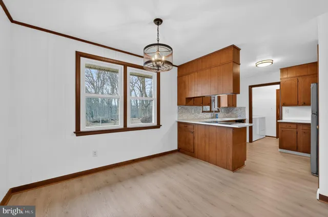 a view of a kitchen and a sink