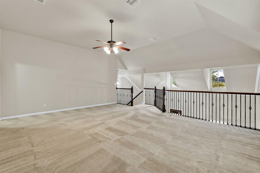 1701 Meadow Ranch Road McKinney, TX 75071 - Photo 23 of 40 a view of a livingroom with a ceiling fan and window