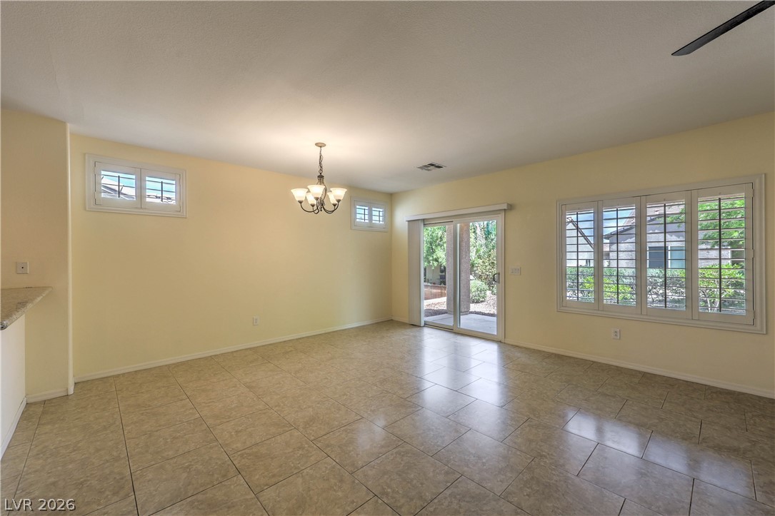 2276 Saxtons River Road Henderson, NV 89044 - Photo 6 of 49 Formal Dining Area with Tile Flooring