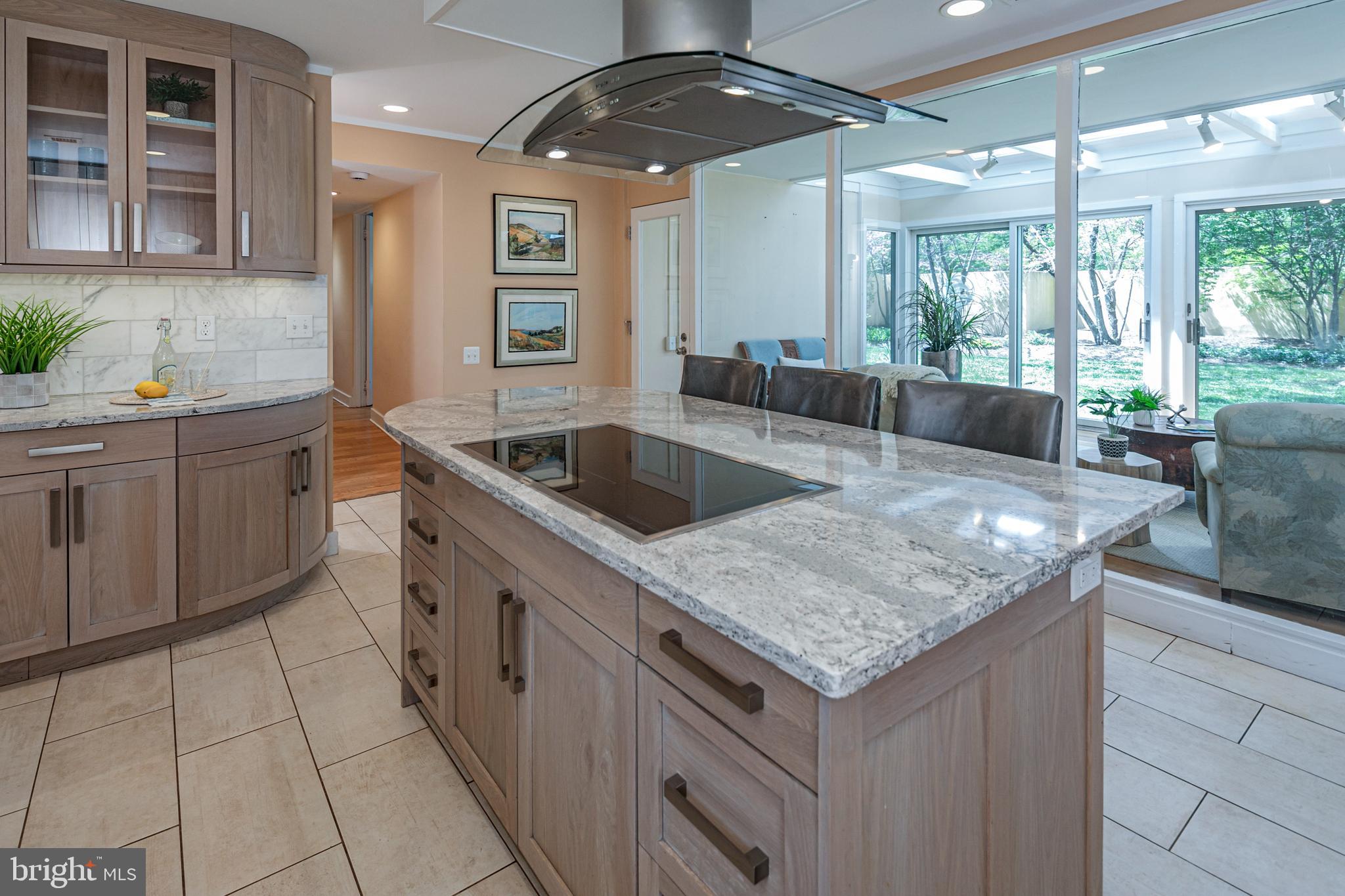 74 Wilson Road Princeton, NJ 08540 - Photo 11 of 43 a kitchen with granite countertop a sink and a refrigerator