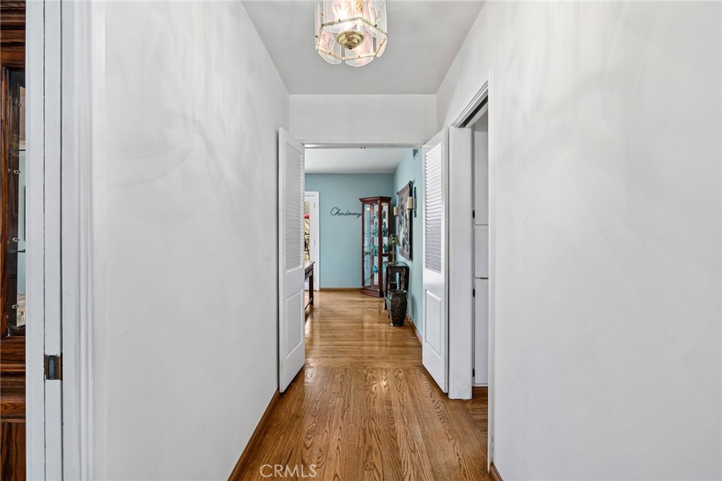 222 South Wagonwheel Road Glendora, CA 91741 - Photo 18 of 70 a view of a hallway with wooden floor