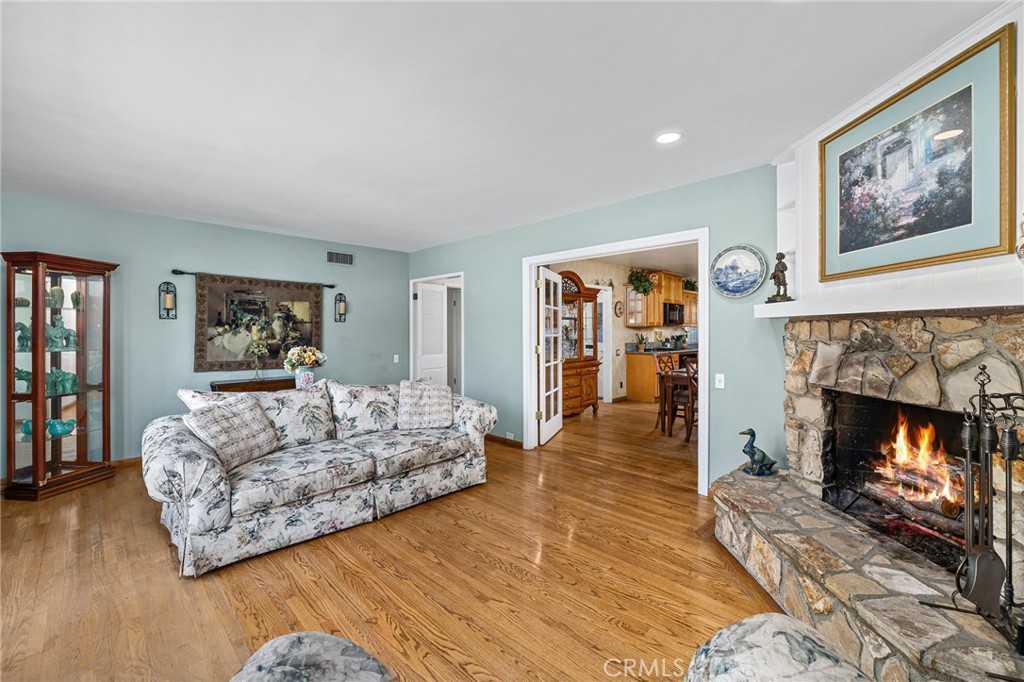 222 South Wagonwheel Road Glendora, CA 91741 - Photo 21 of 70 a living room with furniture and a fireplace