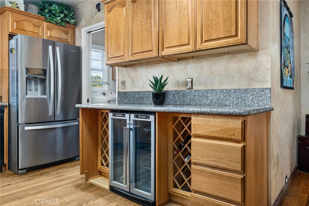 222 South Wagonwheel Road Glendora, CA 91741 - Photo 26 of 70 a kitchen with stainless steel appliances granite countertop a refrigerator and a sink