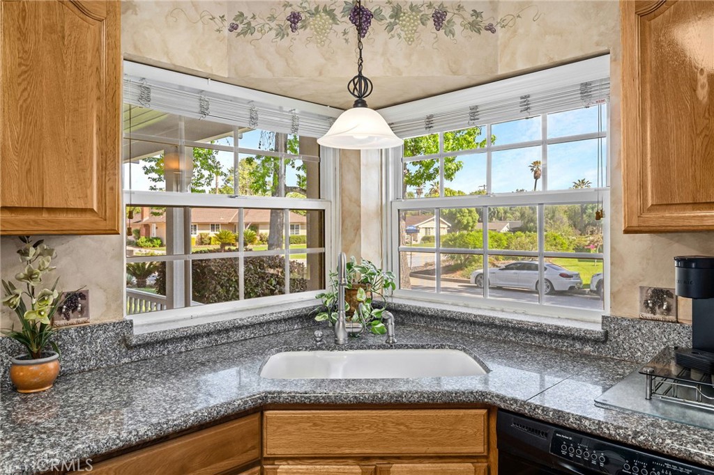 222 South Wagonwheel Road Glendora, CA 91741 - Photo 27 of 70 a view of a kitchen with granite countertop a large window