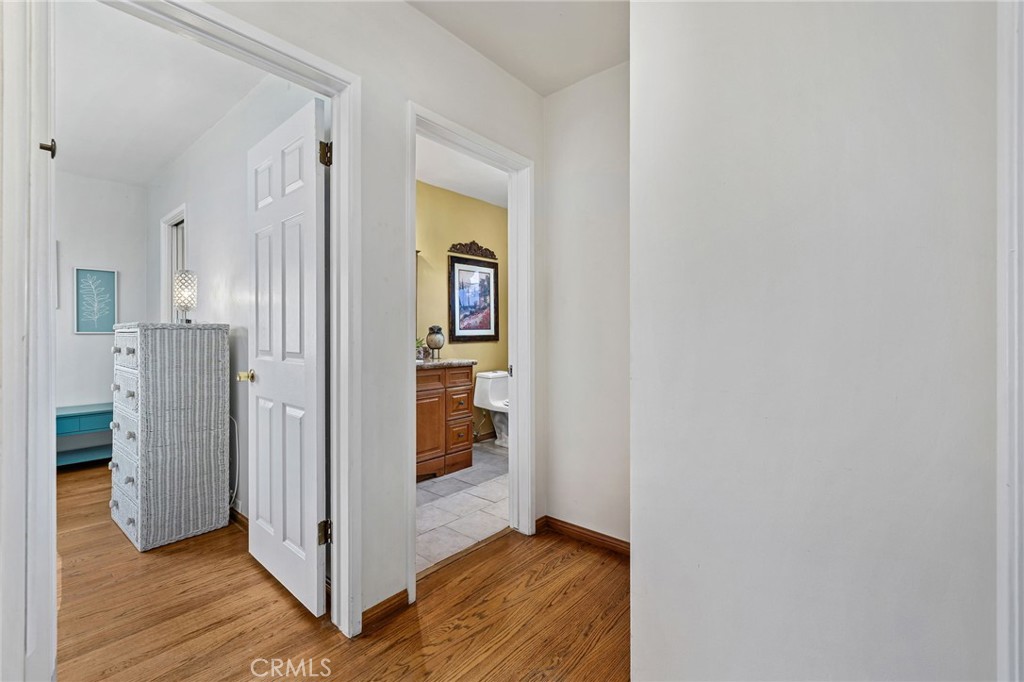 222 South Wagonwheel Road Glendora, CA 91741 - Photo 37 of 70 a view of a hallway with wooden floor and closet area