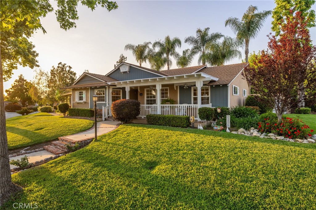 222 South Wagonwheel Road Glendora, CA 91741 - Photo 4 of 70 a front view of a house with a yard and trees