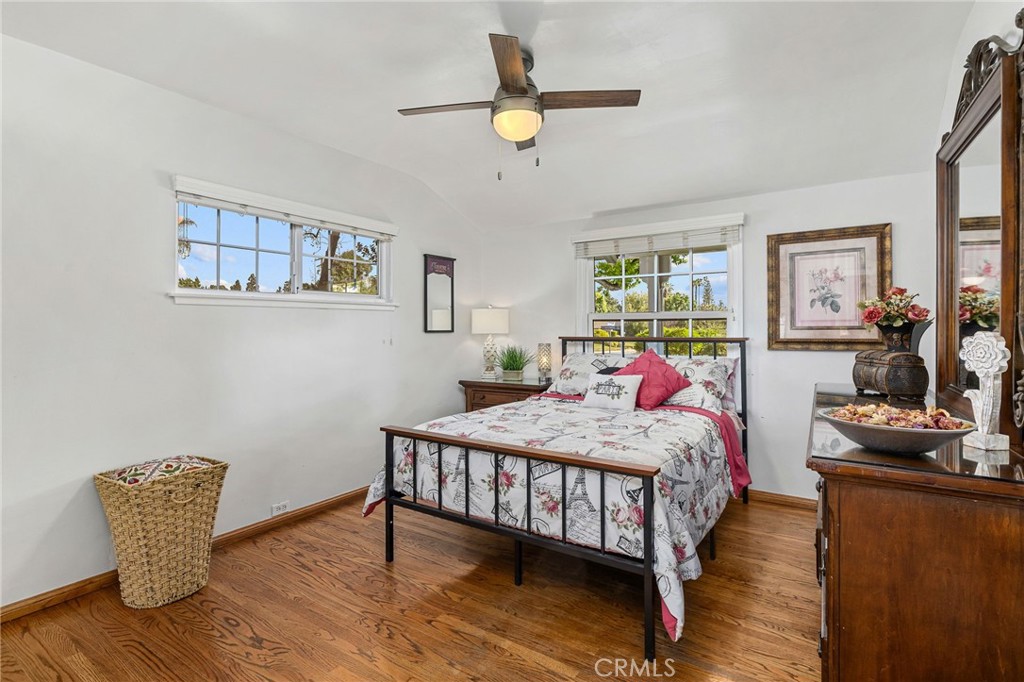 222 South Wagonwheel Road Glendora, CA 91741 - Photo 44 of 70 a bedroom with a bed and wooden floor