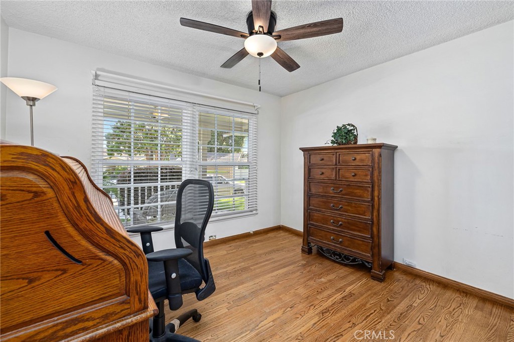 222 South Wagonwheel Road Glendora, CA 91741 - Photo 45 of 70 a view of a workspace with furniture and a window