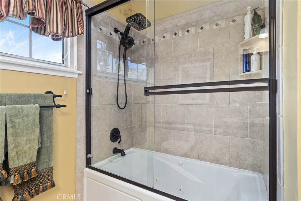 222 South Wagonwheel Road Glendora, CA 91741 - Photo 47 of 70 a bathroom with a shower and a tub
