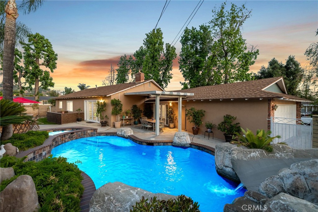 222 South Wagonwheel Road Glendora, CA 91741 - Photo 49 of 70 a front view of house with yard and outdoor seating