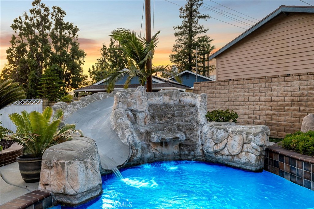 222 South Wagonwheel Road Glendora, CA 91741 - Photo 51 of 70 a house with a table and chairs in patio