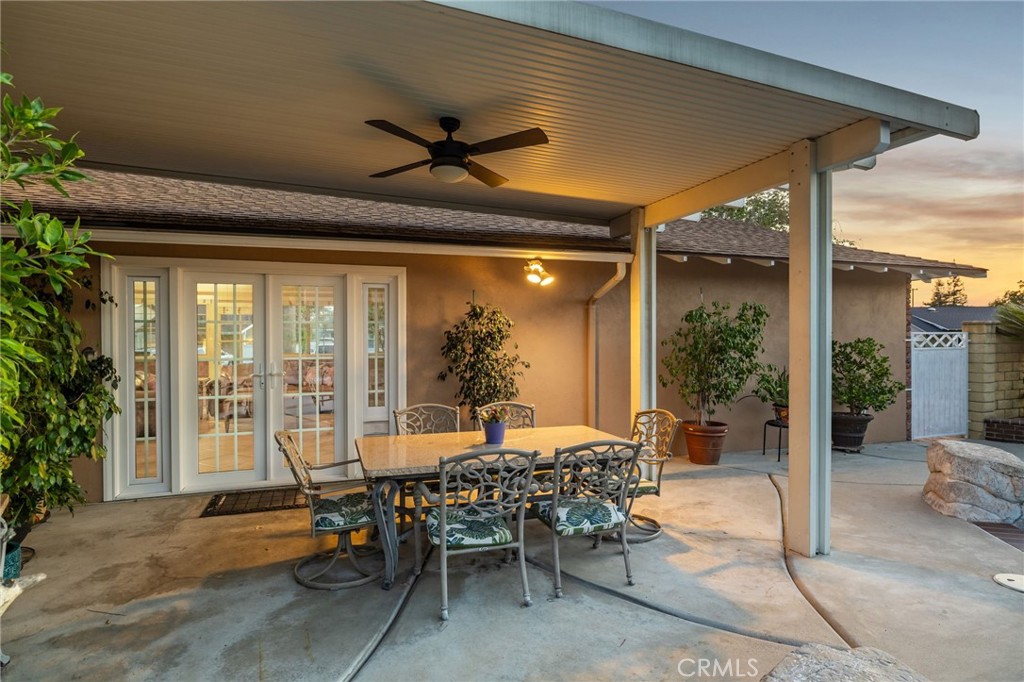 222 South Wagonwheel Road Glendora, CA 91741 - Photo 56 of 70 a dining room with furniture and a floor to ceiling window