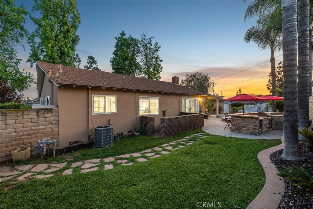 222 South Wagonwheel Road Glendora, CA 91741 - Photo 63 of 70 a front view of a house with a garden