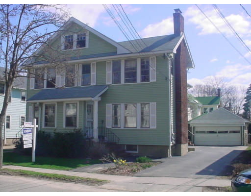 27 Dalton Road, Unit 27 Belmont, MA 02478 - Photo 1 of 1 a front view of a house with a yard