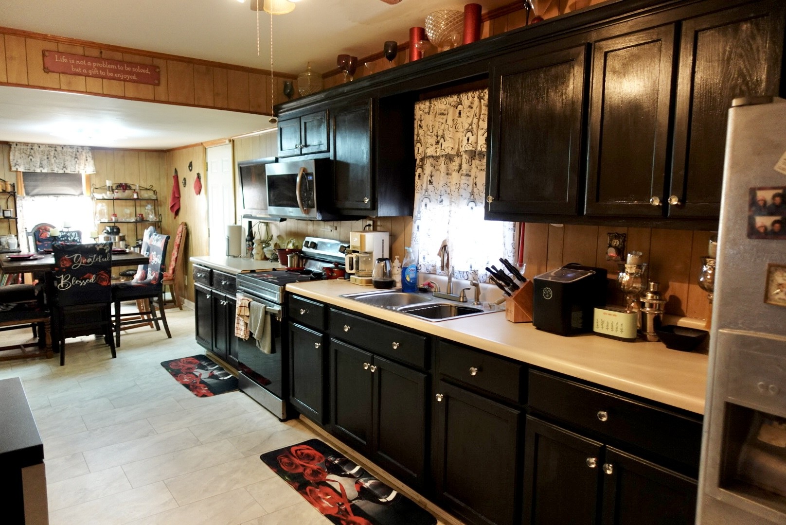 1904 Cherry Street Columbia, TN 38401 - Photo 5 of 10 a kitchen with stainless steel appliances granite countertop a sink dishwasher stove and cabinets
