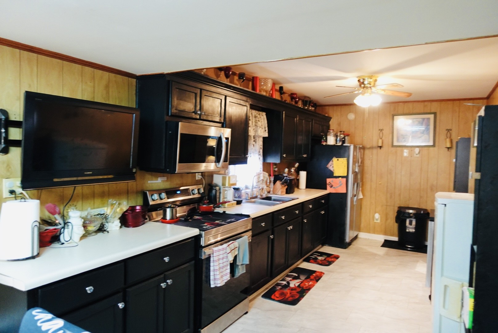 1904 Cherry Street Columbia, TN 38401 - Photo 6 of 10 a kitchen with stainless steel appliances wooden cabinets and a sink