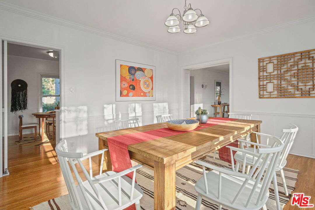 2000 Ridgeview Avenue Los Angeles, CA 90041 - Photo 14 of 50 a view of a dining room with furniture wooden floor and a chandelier