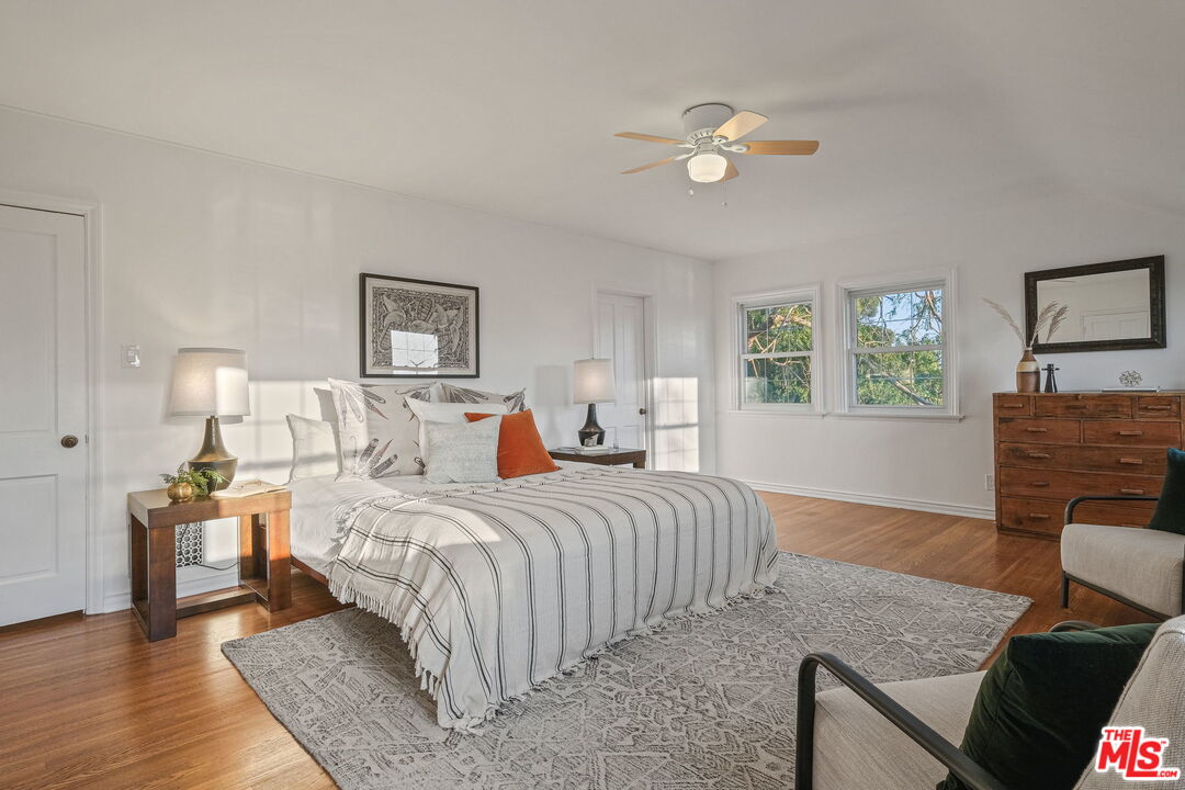 2000 Ridgeview Avenue Los Angeles, CA 90041 - Photo 23 of 50 a bedroom with a bed and wooden floor