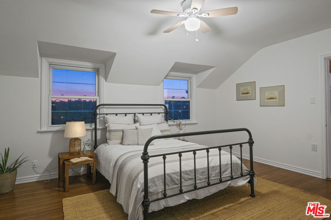 2000 Ridgeview Avenue Los Angeles, CA 90041 - Photo 26 of 50 a bedroom with a bed and wooden floor