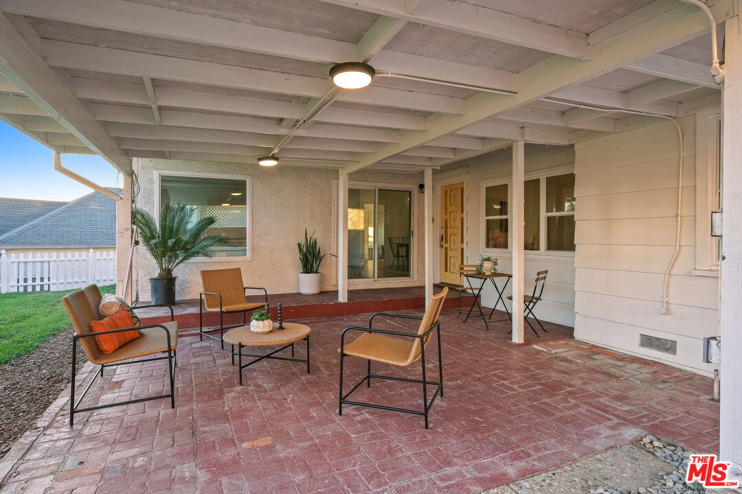 2000 Ridgeview Avenue Los Angeles, CA 90041 - Photo 30 of 50 a living room with patio furniture and a potted plant