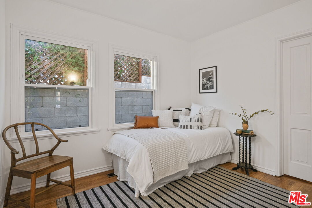 2000 Ridgeview Avenue Los Angeles, CA 90041 - Photo 35 of 50 a bedroom with bed and a chair