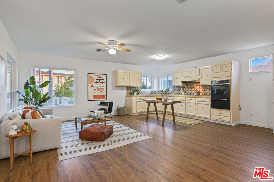 2000 Ridgeview Avenue Los Angeles, CA 90041 - Photo 38 of 50 a living room with furniture kitchen view and a wooden floor