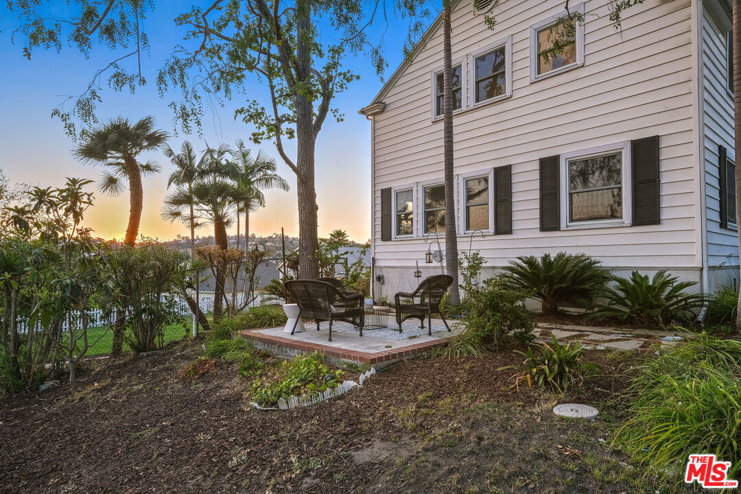 2000 Ridgeview Avenue Los Angeles, CA 90041 - Photo 46 of 50 a view of a house with backyard and sitting area