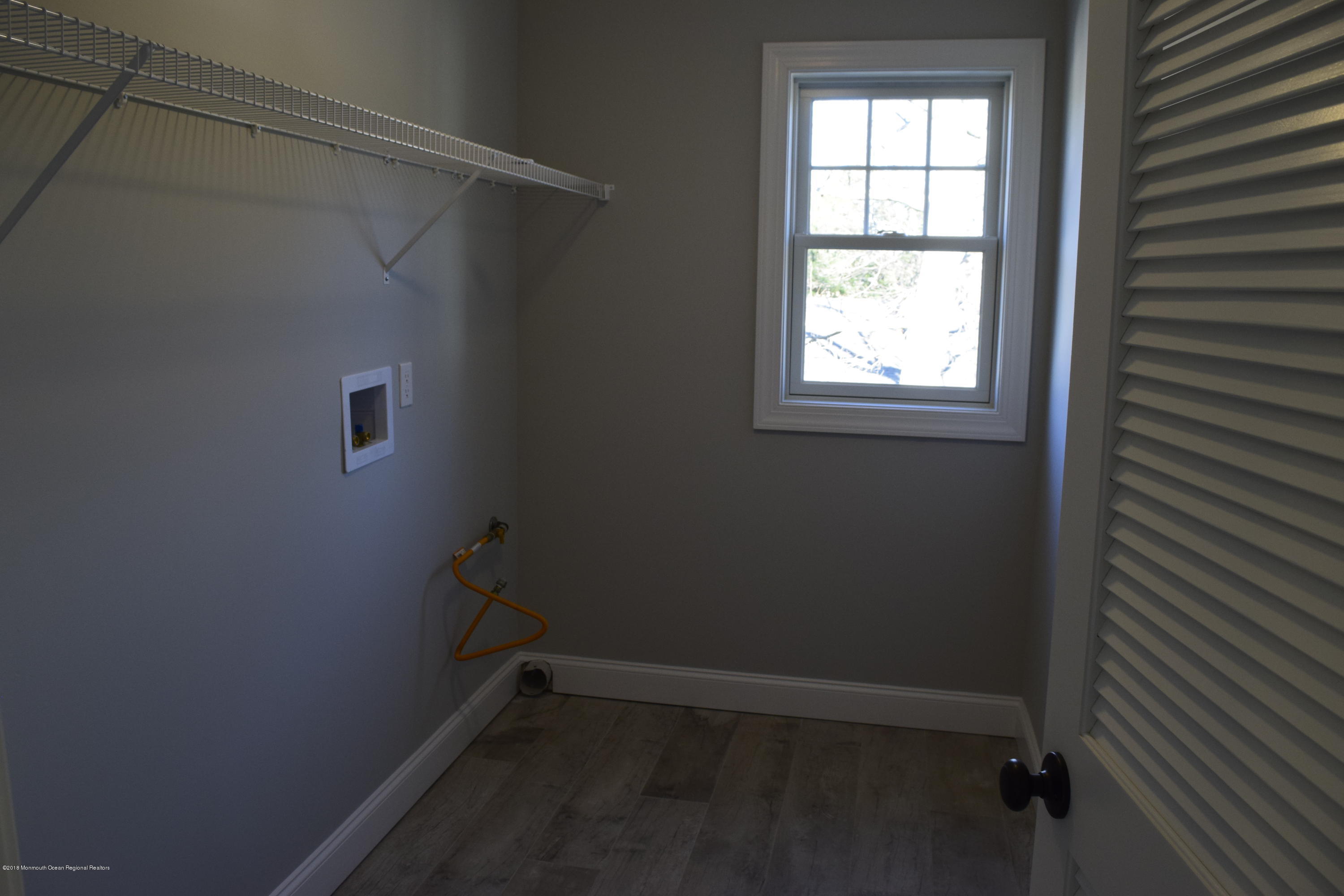 829 Partridge Run Point Pleasant, NJ 08742 - Photo 17 of 31 Upstairs laundry room