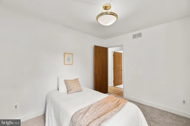 a view of an empty room with a balcony