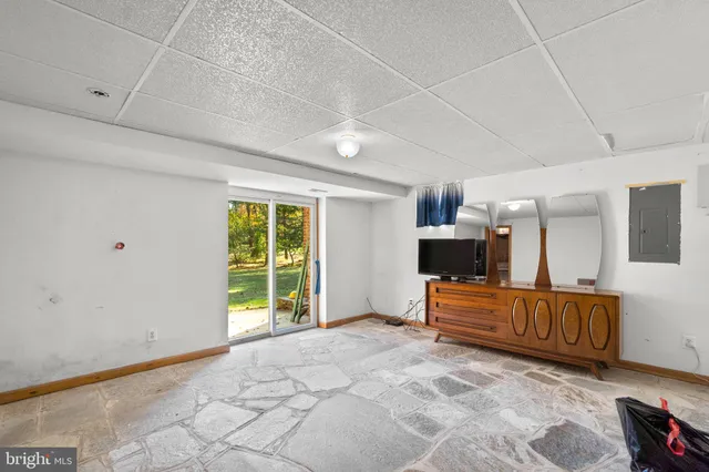 a view of a terrace with furniture and wooden floor