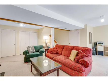 a living room with furniture and a couch