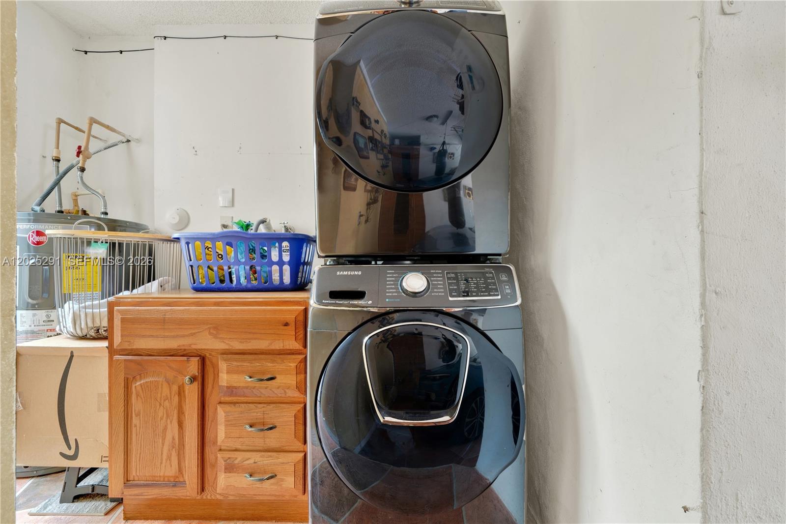 10006 Southwest 162nd Path Miami, FL 33196 - Photo 28 of 40 a utility room with dryer and washer
