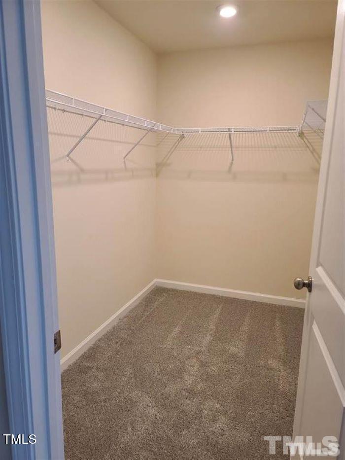 401 Purdue Drive Durham, NC 27713 - Photo 4 of 14 a view of a room with racks on the wall