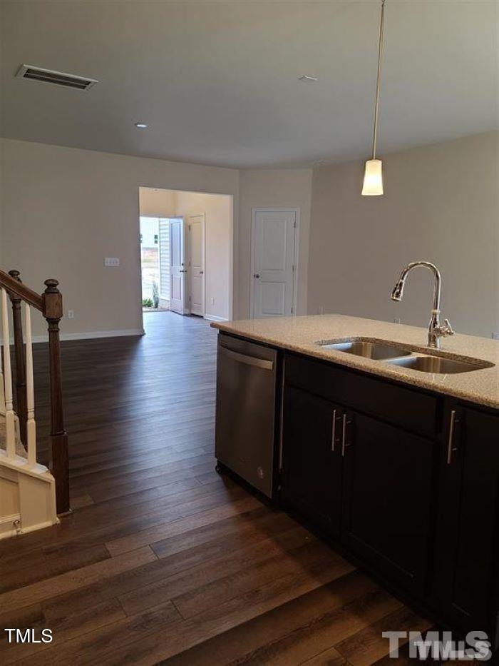 401 Purdue Drive Durham, NC 27713 - Photo 6 of 14 a kitchen with a sink and cabinets