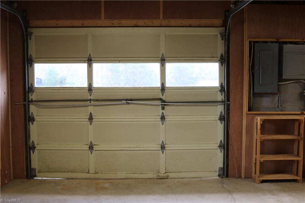 2105 Hickswood Road High Point, NC 27265 - Photo 23 of 24 Basement Garage one of three other spots to park.