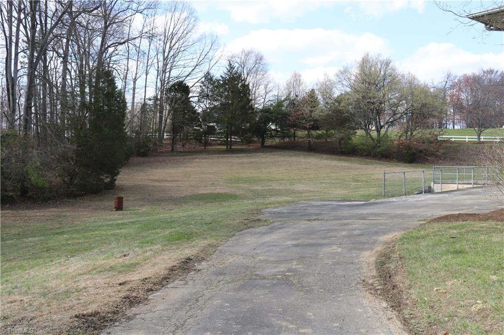 2105 Hickswood Road High Point, NC 27265 - Photo 4 of 24 Tons of yard with some beautiful trees.