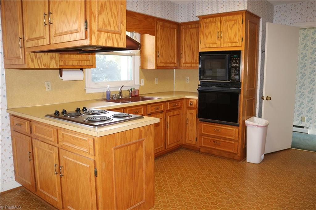 2105 Hickswood Road High Point, NC 27265 - Photo 9 of 24 kitchen includes stove top, microwave, built in oven and dishwasher.
