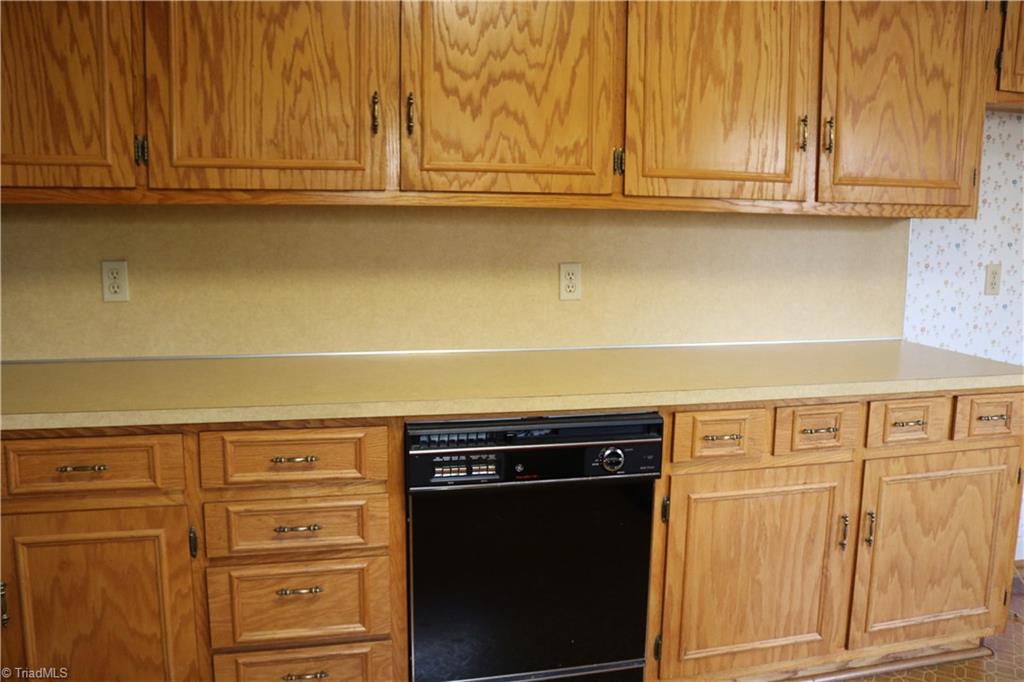 2105 Hickswood Road High Point, NC 27265 - Photo 10 of 24 Plenty of cabinets in this kitchen.