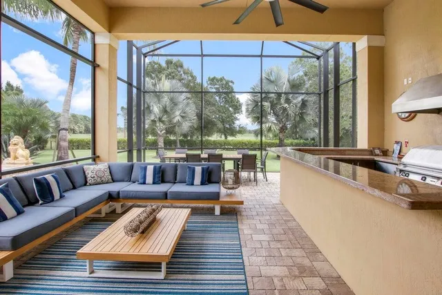 a view of balcony with furniture and outdoor seating