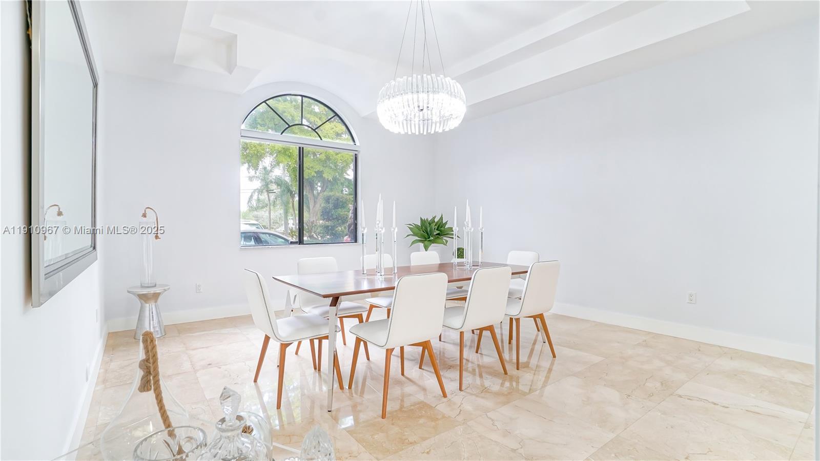 6950 Southwest 97th Avenue Miami, FL 33173 - Photo 14 of 22 a view of a dining room with furniture window and outside view