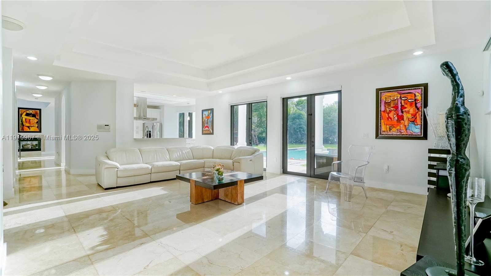 6950 Southwest 97th Avenue Miami, FL 33173 - Photo 19 of 22 a living room with furniture and a flat screen tv
